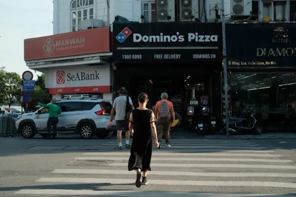 Saham Domino’s Pizza: Profil, Kinerja, Harga, dan Cara Beli